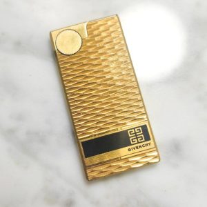 Mechero Zippo Givenchy vintage bañado en oro