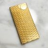 Mechero Zippo Givenchy vintage bañado en oro