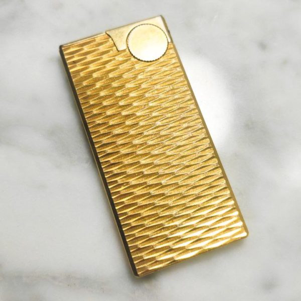 Mechero Zippo Givenchy vintage bañado en oro