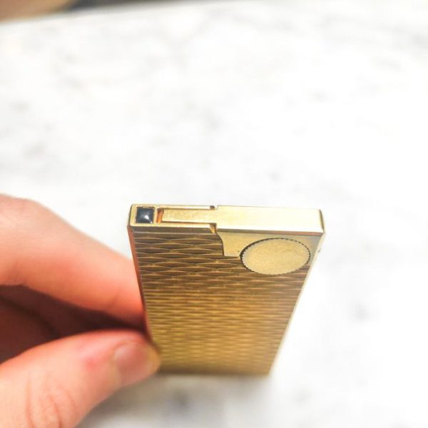 Mechero Zippo Givenchy vintage bañado en oro