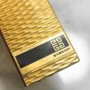 Mechero Zippo Givenchy vintage bañado en oro