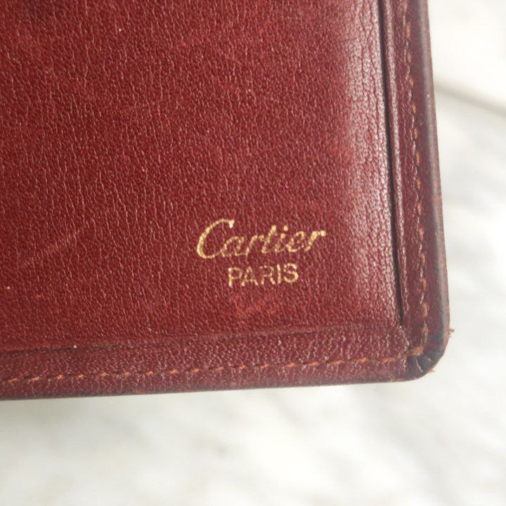 Cartera Bi-fold Cartier Must Line de Cuero Rojo Burdeos.París