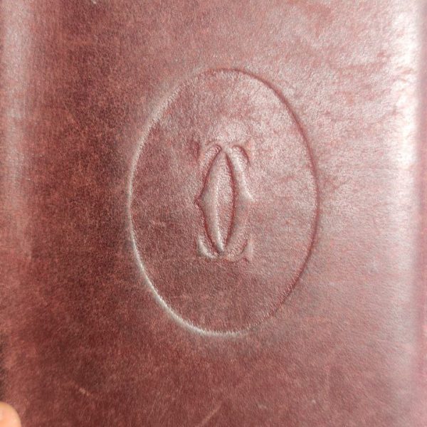 Cartera Bi-fold Cartier Must Line de Cuero Rojo Burdeos.París