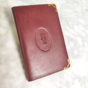 Agenda / Libreta de Direcciones Cartier Must Line de Cuero Rojo Burdeos