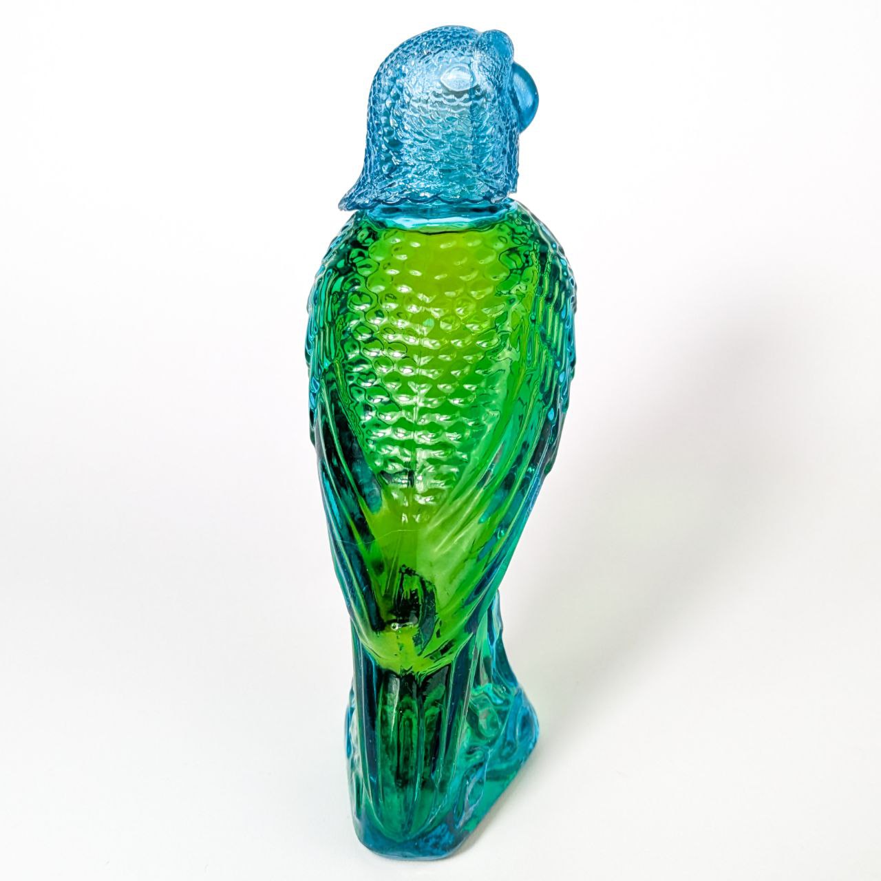 Botella vintage de colonia Avon Island Parakeet Moonwind c.1970