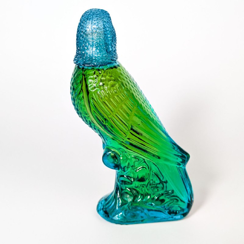 Botella vintage de colonia Avon Island Parakeet Moonwind c.1970