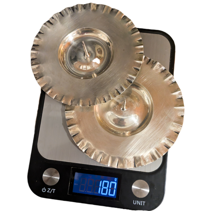 Platos de plata "800" con frutas vela