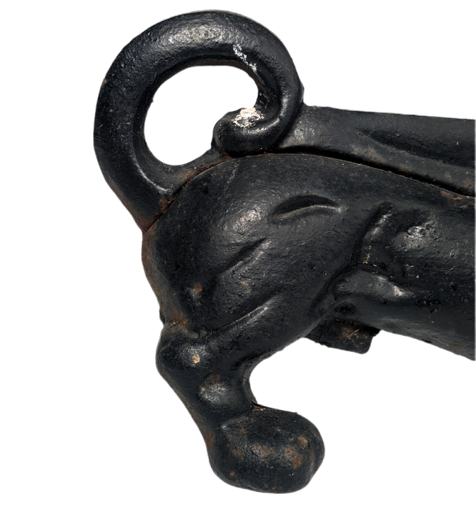 Perro daschund quitabarro de hierro fundido