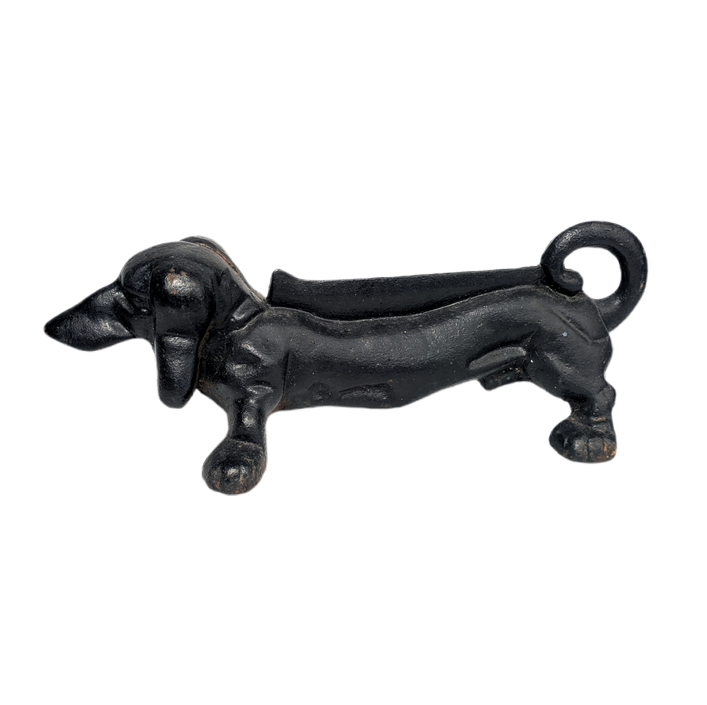 Perro daschund quitabarro de hierro fundido