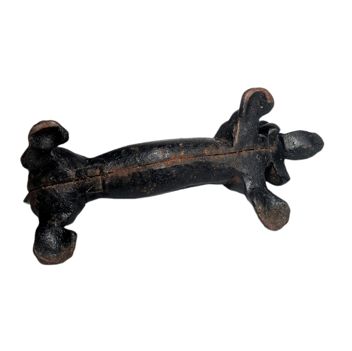 Perro daschund quitabarro de hierro fundido