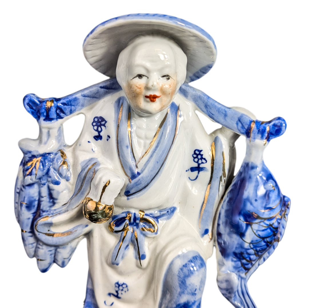 Figuras Chinas de pescador y paisana en porcelana c.1970
