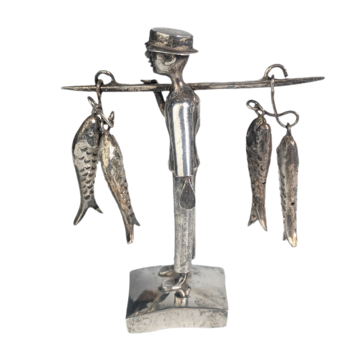 LOTE000794_04-1.png Figura de pescador de plata de exportación de Indonesia