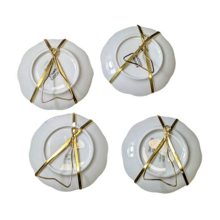 LOTE000833_02-1.png Conjunto de 4 platitos de Limoges Franceses s.XX